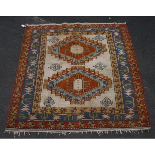 120 - 20th C Turkish style rug fawn ground with two central medallions ad geometric border and stars, 133c... 