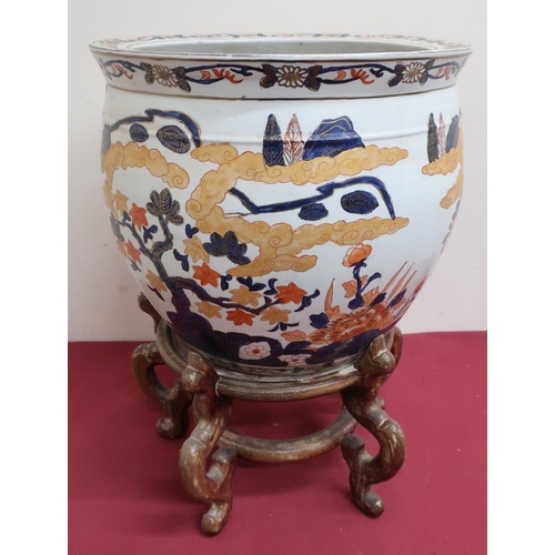 5 - Japanese fishbowl, the exterior decorated in Imari pallette with trailing foliage, the interior with... 