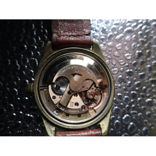 321 - Omega Genève automatic wristwatch with date. Gold plated case on later leather strap. Stainless stee... 