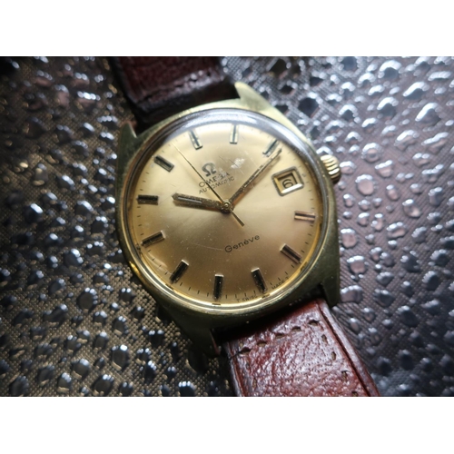 321 - Omega Genève automatic wristwatch with date. Gold plated case on later leather strap. Stainless stee... 