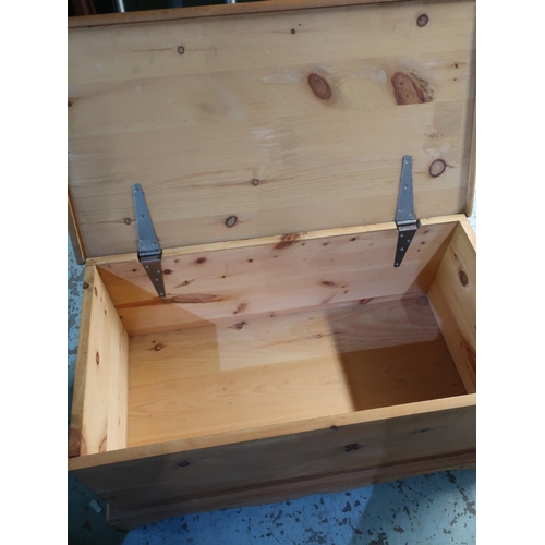 333 - Pine blanket box with hinged top, on shaped apron with  bracket feet, W90cm H43cm D47cm