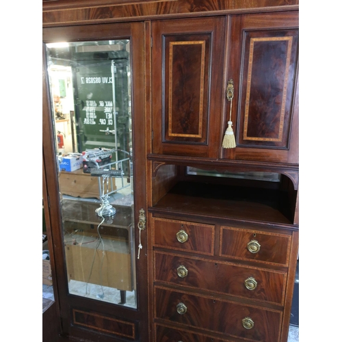 336 - Edwardian inlaid mahogany wardrobe, with single mirror door and two panel doors above two short and ... 