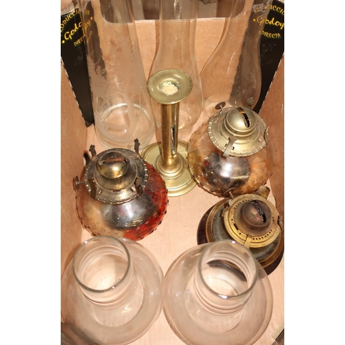 380 - Brass oil lamp converted to electric, a Chalwyn Tropic Tilly type lamp, three oil lamps with glass s... 