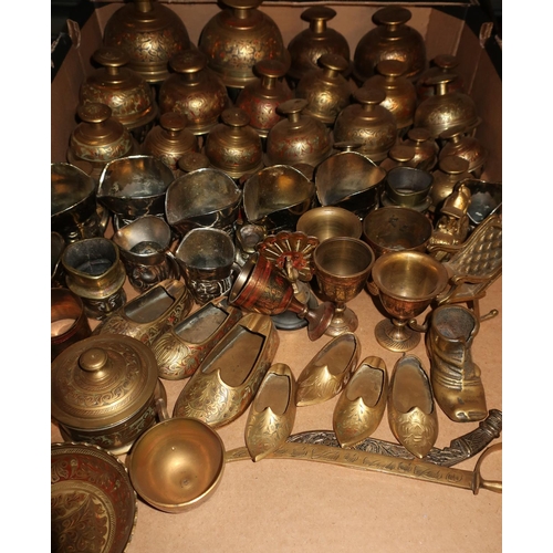 384 - Large collection of early 20th C Indian brassware including Elephant bells (25), vases cigarette box... 