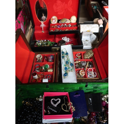 386 - Large collection of costume jewellery including rings, necklaces, beads etc with three jewellery box... 