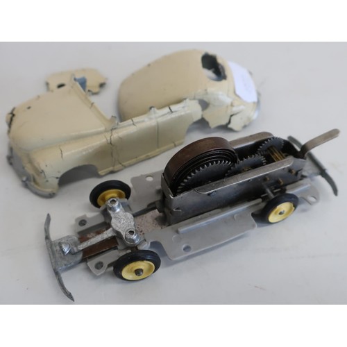 306 - English die-cast clockwork motor car (in poor condition)