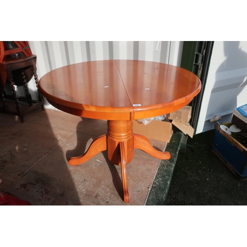 265A - Light wood circular extending dining table on single column with four outsplayed supports, D106cm