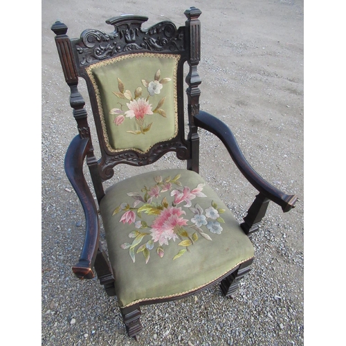 225 - Victorian stained as rosewood open armchair, with carved top rail and needlework seat & back, on car... 