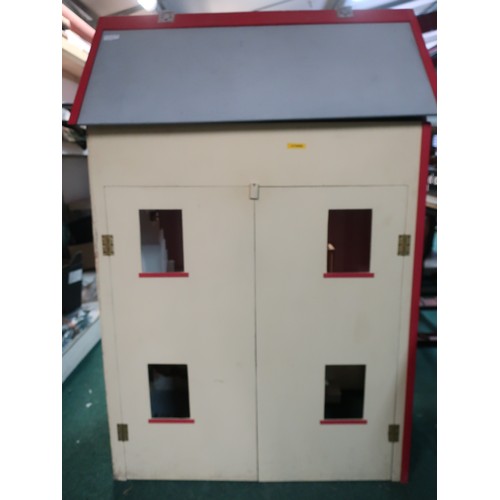 334 - Large wooden double fronted dolls house consisting of two bedrooms, living room, kitchen and loft sp... 