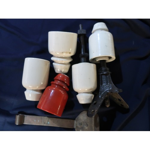 337 - Four ceramic insulators, an LNWR ceramic insulator on original cast iron bracket (height 28cm) and a... 