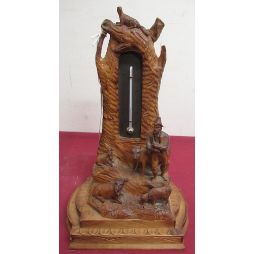 67 - Early 20th C Black Forest desk thermometer, carved with a Tyrolean shepherd and his flock, H24cm