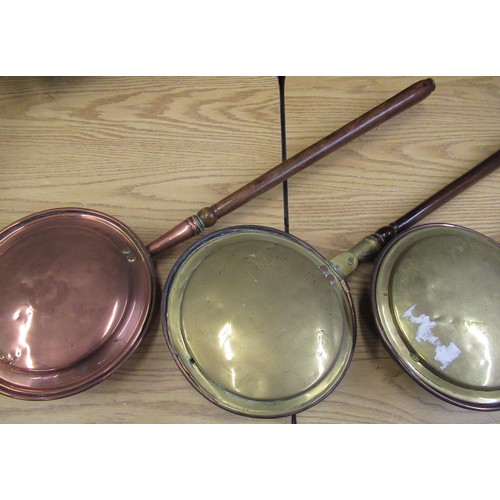 260 - Copper warming pan and two other 19th C copper and brass warming pans (3)