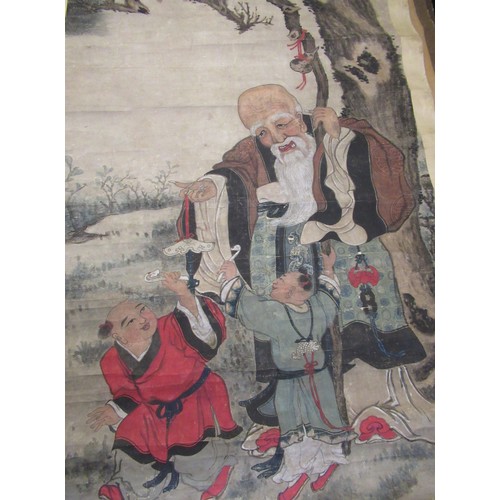 79 - Chinese School, (late 19th C/early 20th C) scroll painting: Figure of an elderly gentlemen with two ... 