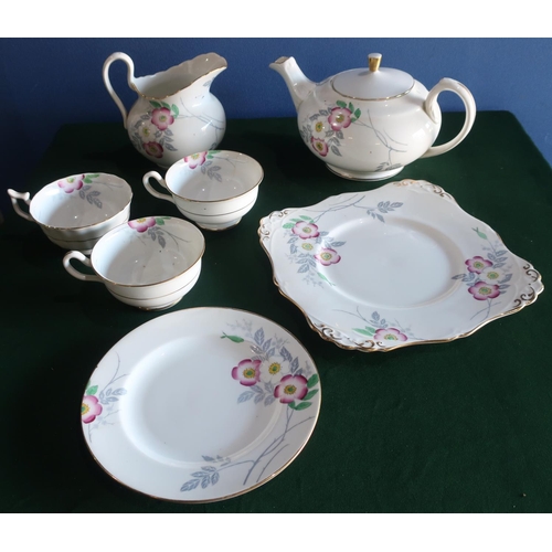 349 - New Chelsea tea service printed and enameled with flowers, eight cups, two jugs, tea pot, sandwich p... 