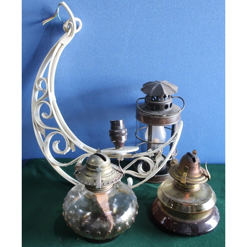 380 - Brass oil lamp converted to electric, a Chalwyn Tropic Tilly type lamp, three oil lamps with glass s... 