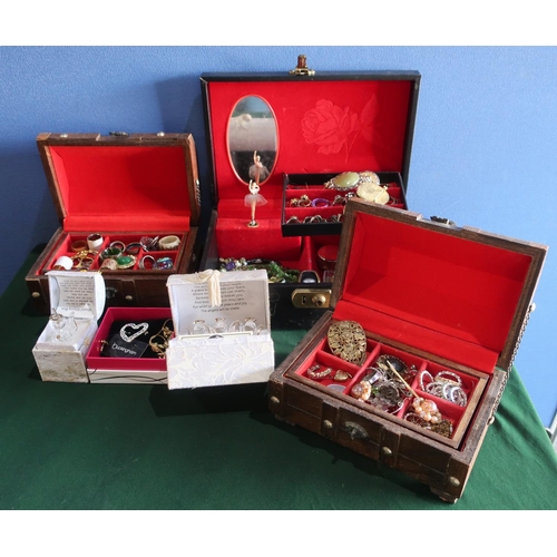 386 - Large collection of costume jewellery including rings, necklaces, beads etc with three jewellery box... 