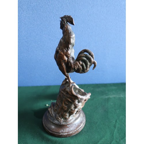73 - After Auguste Nicolas Cain (1822-1894), bronze spill holder modelled as a cockerel perched on a bask... 