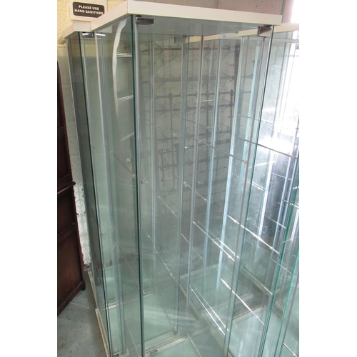 338 - Three modern glazed display cabinets, each with three shelves, W43cm D37cm H162