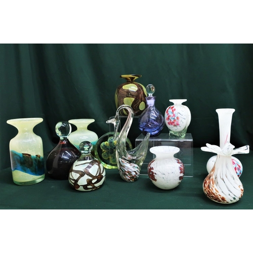 69 - Collection of Mdina and other green, white and brown glassware including vases, swan and small decan... 