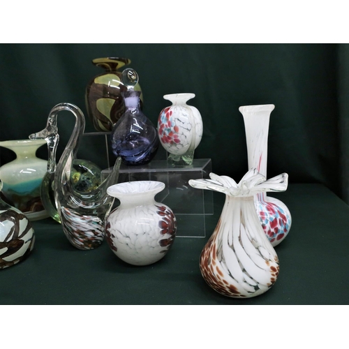 69 - Collection of Mdina and other green, white and brown glassware including vases, swan and small decan... 