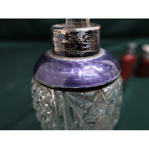 128 - Geo.V cut glass scent bottle with silver and enamelled collar (marks rubbed) with faceted stopper, a... 