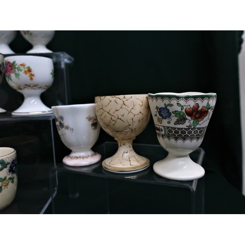 133 - Collection of egg cups including Mintons, Royal Doulton, Royal Cauldron, Paragon, Coalport, Royal Wo... 