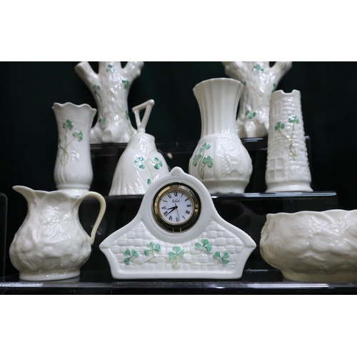 136 - Collection of Belleekvchina with clover design including hand bell, clock, bowls, vases etc and anot... 