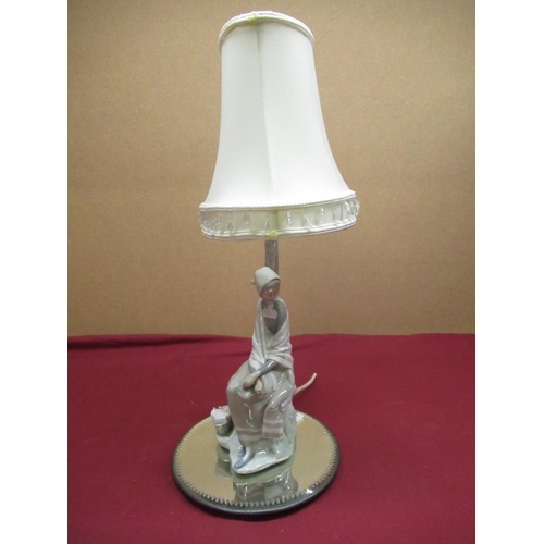 234 - Lladro figural table lamp with circular mirrored stand D22.5cm (2)