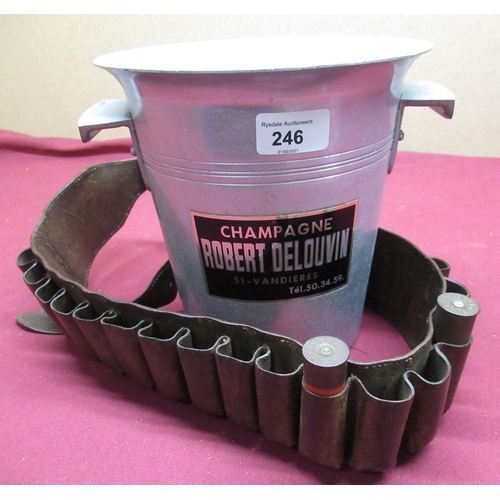 246 - Robert Delouvin aluminium champagne bucket and a vintage shotgun cartridge belt