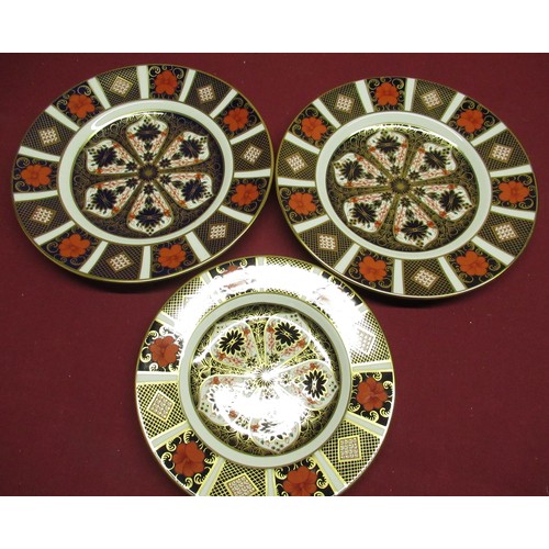 12 - Pair of Royal Crown Derby 11 28 Imari pattern circular plates D22cm and another similar smaller plat... 