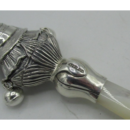 405 - Silver babies rattle with Mother of Pearl handle, stamped sterling, H8cm