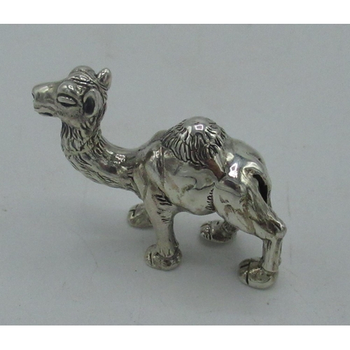 79 - Silver figure of a camel stamped sterling, H.3cm