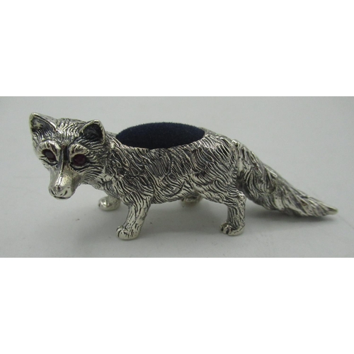 85 - Silver fox pin cushion with ruby eyes stamped sterling, L.6cm