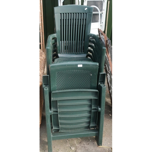 11 - Set of six green plastic garden chairs with one recliner