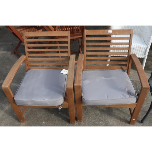 9 - Pair of wooden garden chairs with cushions