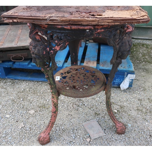 467 - Three legged cast iron pub table