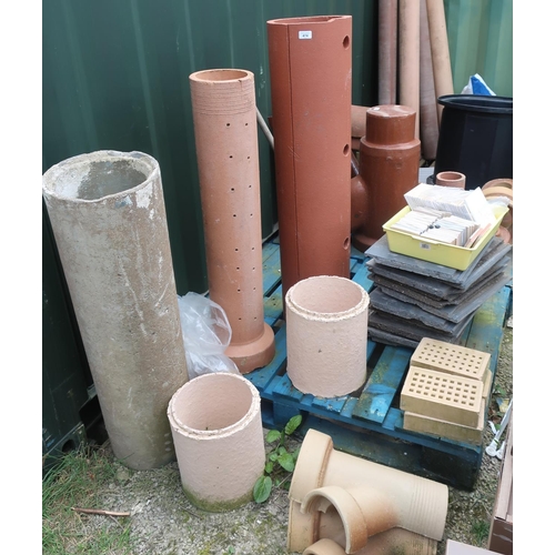 474 - Extremely large collection of drainage pipes, roofing tiles, connecting tiles, ridge tiles, air bric... 