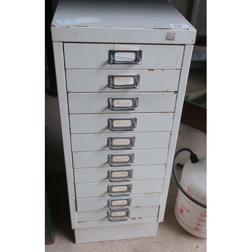 124 - Small filing cabinet with 10 drawers