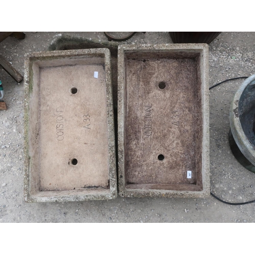 487 - Pair of Cotstone troughs