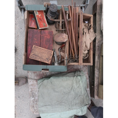 503 - Box containing items of camping equipment including fly sheet, set of scales with brass weights, hur... 