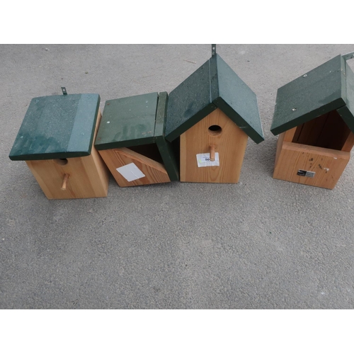 506 - Set of nesting boxes including swallows, two tit boxes and a sparrows box