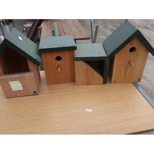 507 - Set of nesting boxes including swallows, two tit boxes and a sparrows box