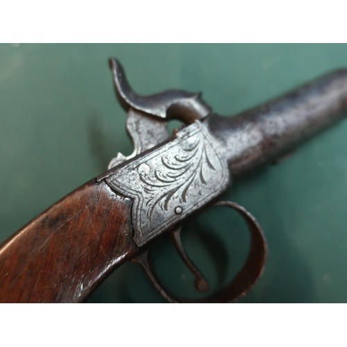 86 - Percussion cap pocket pistol, with 2 inch turn off barrel, proof marks to the base, engraved detail ... 