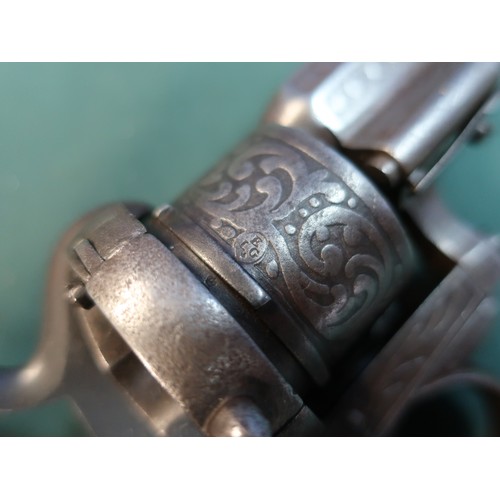 87 - Six shot pinfire revolver c. 1860. Continental, possibly German.  15cm (6”) round barrel.  Foliate d... 