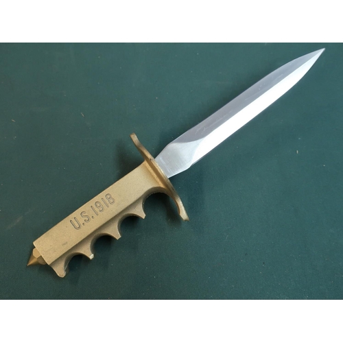 76 - U.S military style knife with 6 inch double edged blade and brass grip stamped US 1918