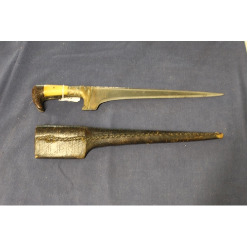 35 - 19th C indo Persian dagger with 11 inch tapering blade with broad back strap with metal and bone mou... 