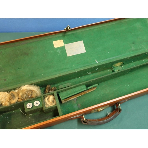 298 - Tan oak and leather gun case with three compartments with the label referring to William Evan's Ltd.... 