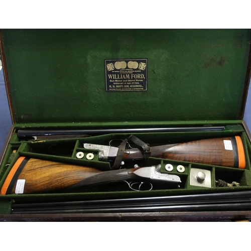 438 - Leather cased pair of William Ford 12 bore side by side boxed ejector shotguns with 26 inch barrels ... 