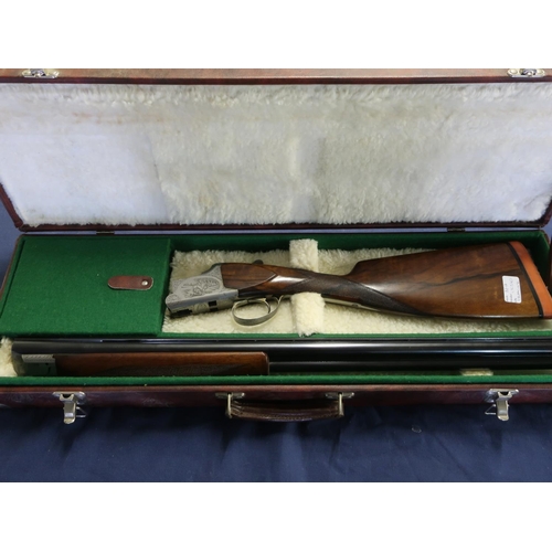 439 - Cased Browning BRG lightweight 12 bore over and under game gun with dingle trigger action and 27.5in... 