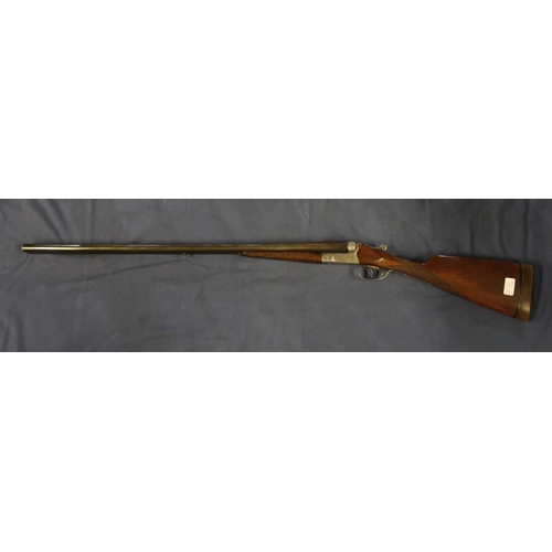 447 - Belgium 12B bar in action side by side shotgun, with 30 inch barrels with gilt scroll inlaid detail,... 